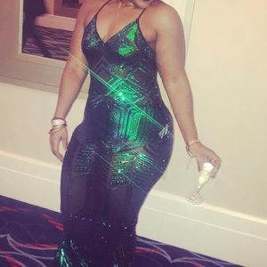 Beautiful emerald green sequin New Years Eve dress.